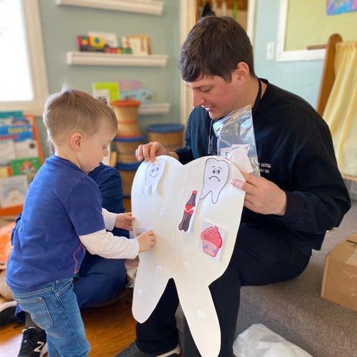 andrew teaching child